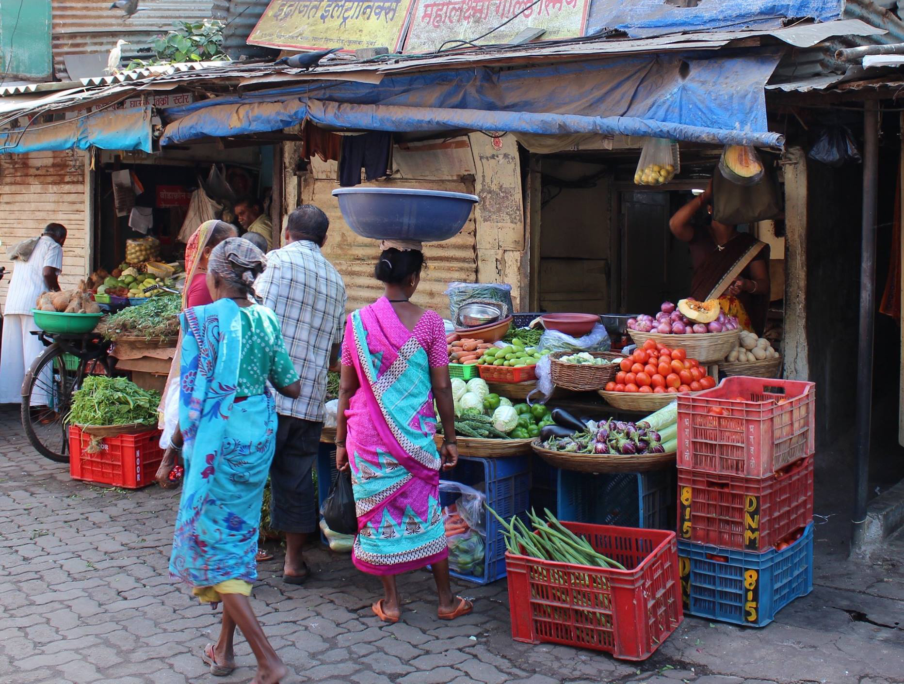People at a vegetable stand in Hubli 