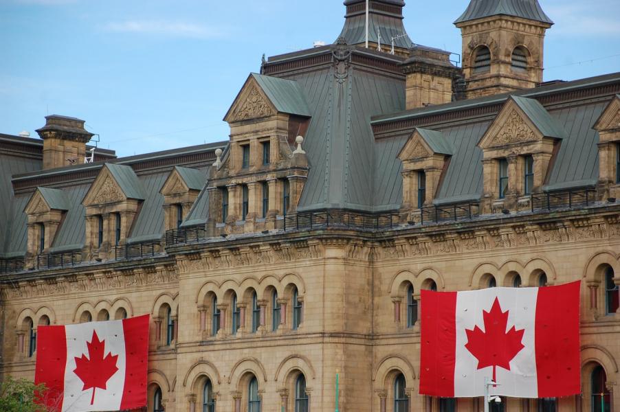 Canadian flags strung on a building in Ottawa, Canada