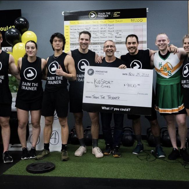 Photo of the Innovative Fitness team after raising money at a charity event