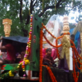 Children sitting on a fully decorated float