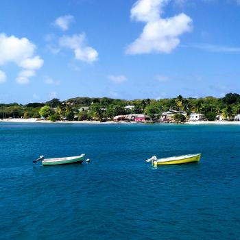 Two small boats in Barbados water