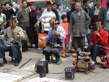 Musicians playing local instruments in Xi'an