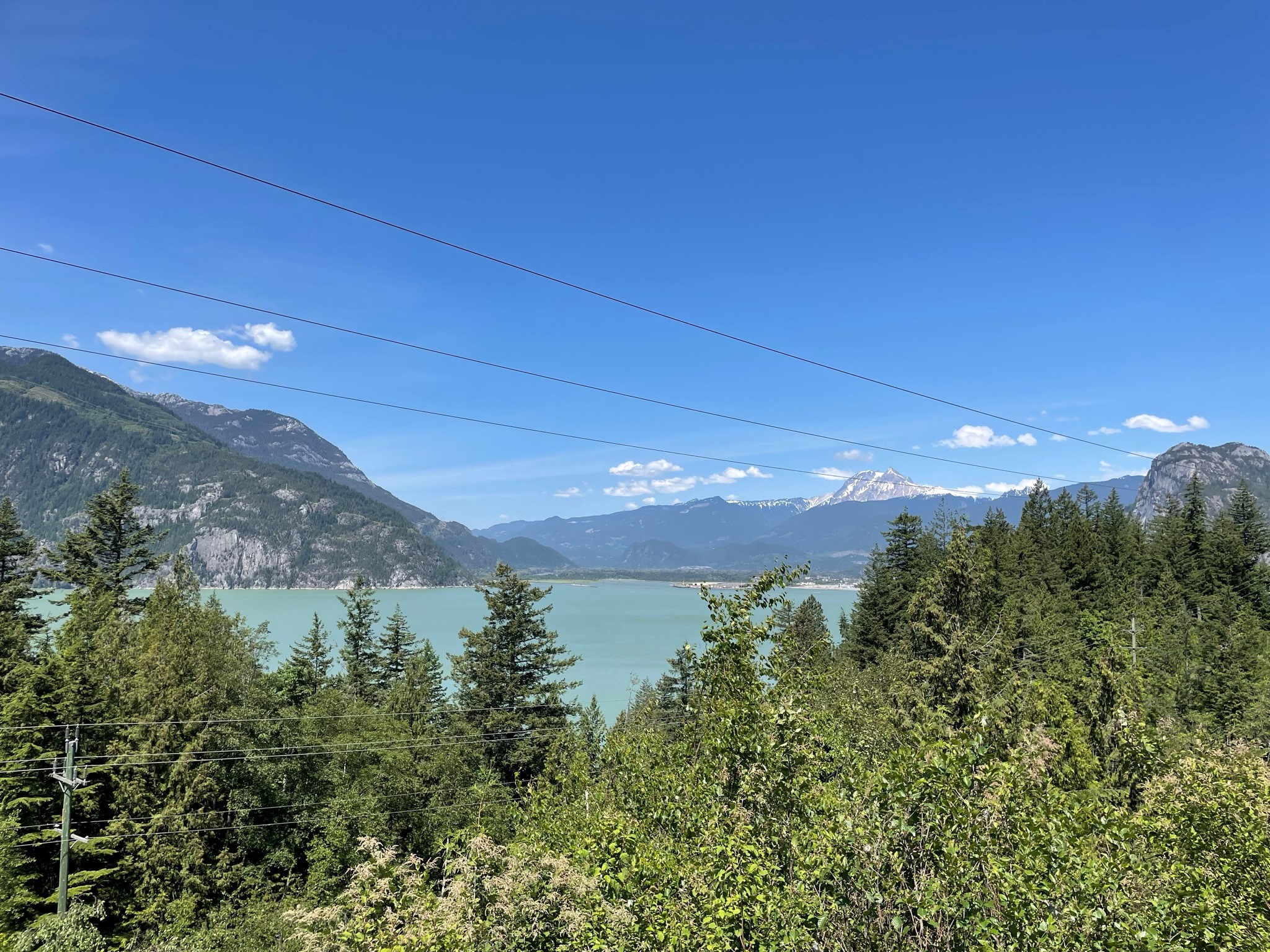 A snapshot of Howe Sound with Mount Garibaldi or Nch’ḵay̓, in the background, as seen on a stopover on the Sea to Sky Highway, near Brittania Beach.