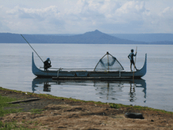 fisherman boat docked at the shore