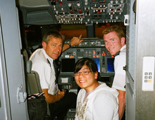 Robin with two pilots in the cockpit 