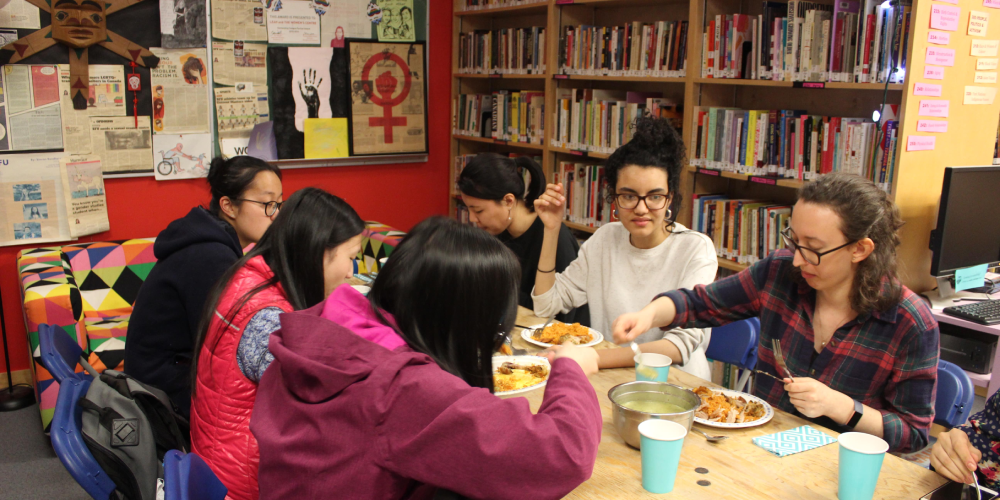 International Students sharing a meal