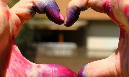 Hands painted making a heart shape