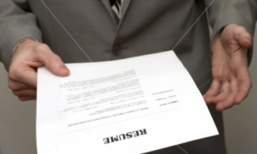 Person holding a resume