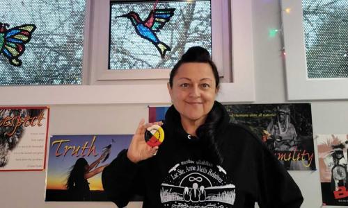 Image of Shelley holding the Medicine Wheel