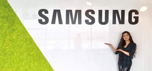 Sabrina Kan in front of a Samsung logo