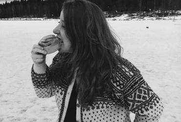 Standing on Sognsvann eating a kanelbolle in my new Norwegian sweater. The only things missing are some cross country skis!
