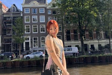 Me standing alongside a canal in central Amsterdam