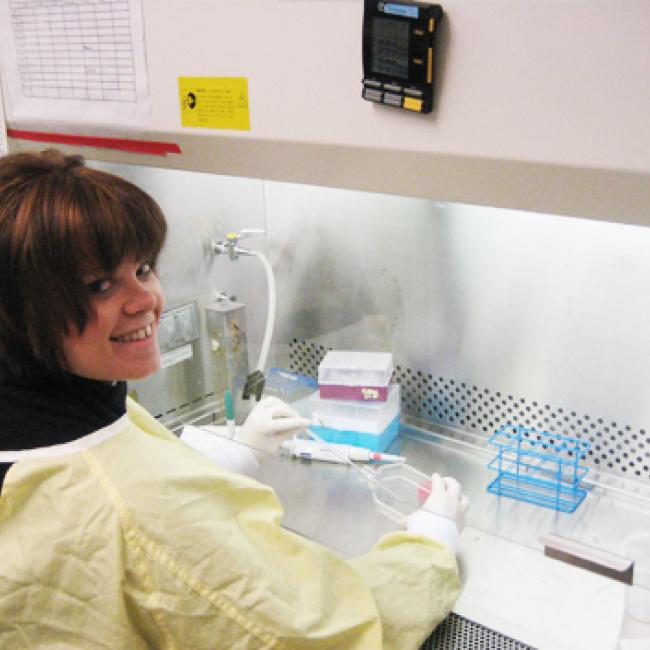 picture of marlo in a lab, smiling