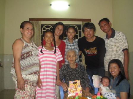 Melissa and a group of her friends and family in Cambodia