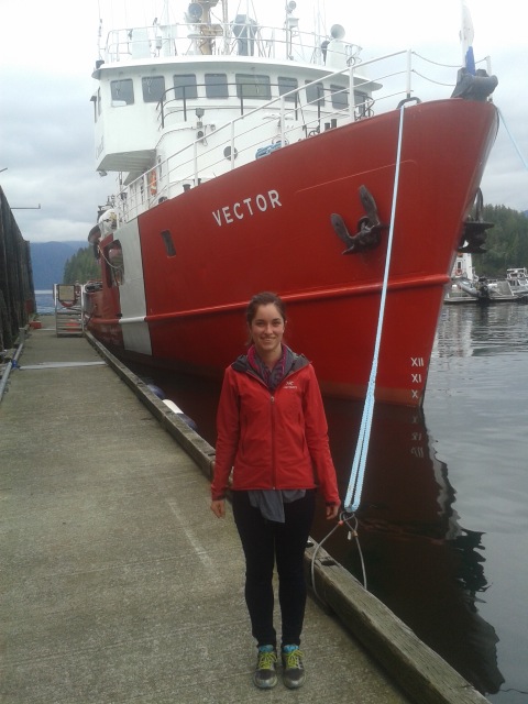 The author standing in front of a boat