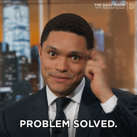 Trevor Noah tapping his temple then pointing at camera, with the caption "problem solved"