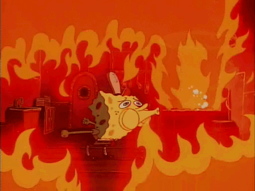 GIF of SpongeBob surrounded by a fire trying to get everything under control