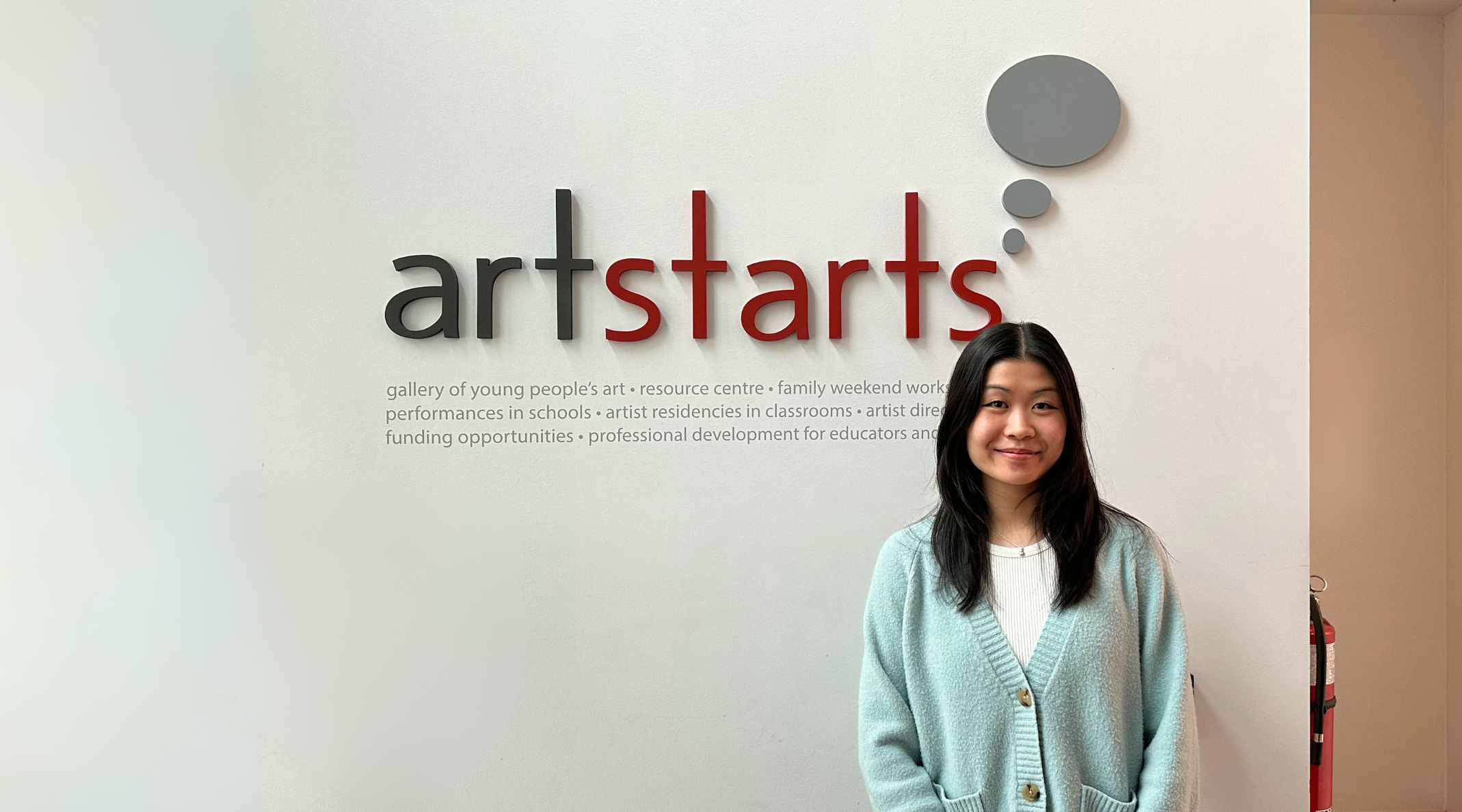 Erin Lum on the job at the ArtStarts Downtown Vancouver office. (Photo by Alice Kim)