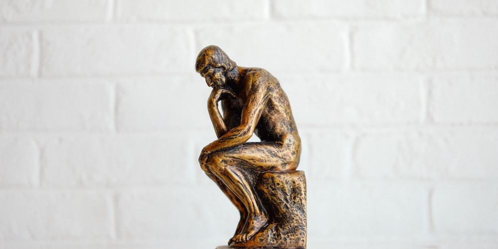Statue of a thinking person