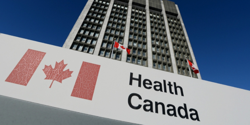 A sign is displayed in front of Health Canada headquarters in Ottawa