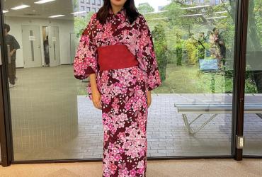 Aoife wearing a yukata with a pink floral design