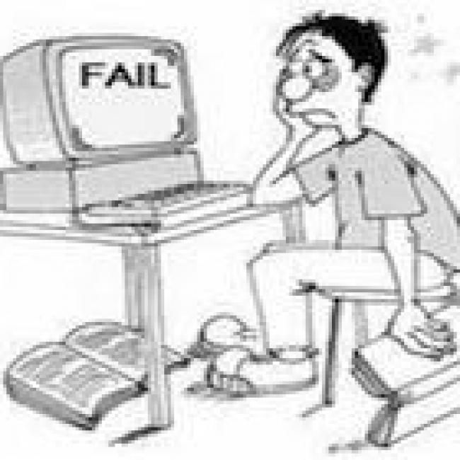 Cartoon drawing of a student sitting at a computer with a sad expression and the word "fail" on their computer screen.
