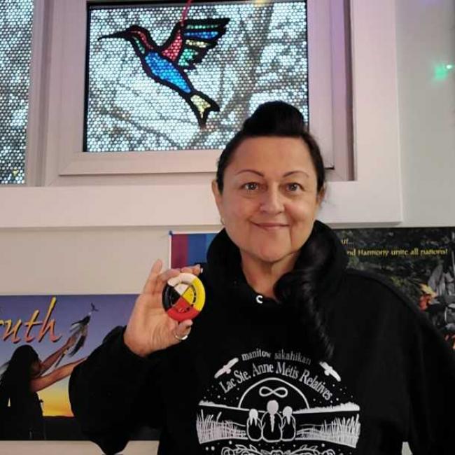 Image of Shelley holding the Medicine Wheel