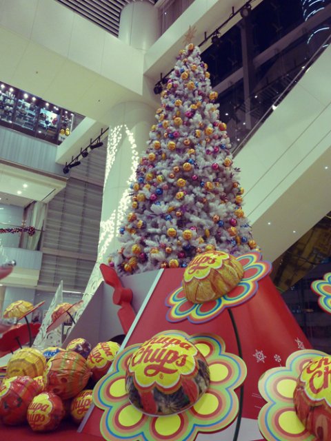 a Christmas tree covered in ChupaChups lollipop