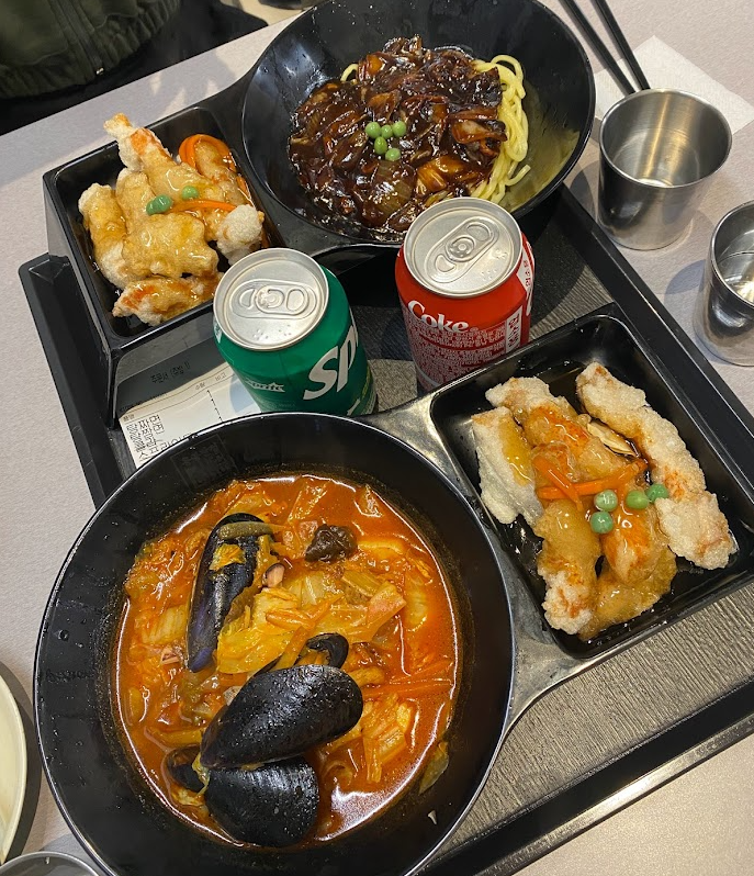 Bowls of spicy seafood noodles ("jjamppong") and black bean noodles ("jjajangmyeon")