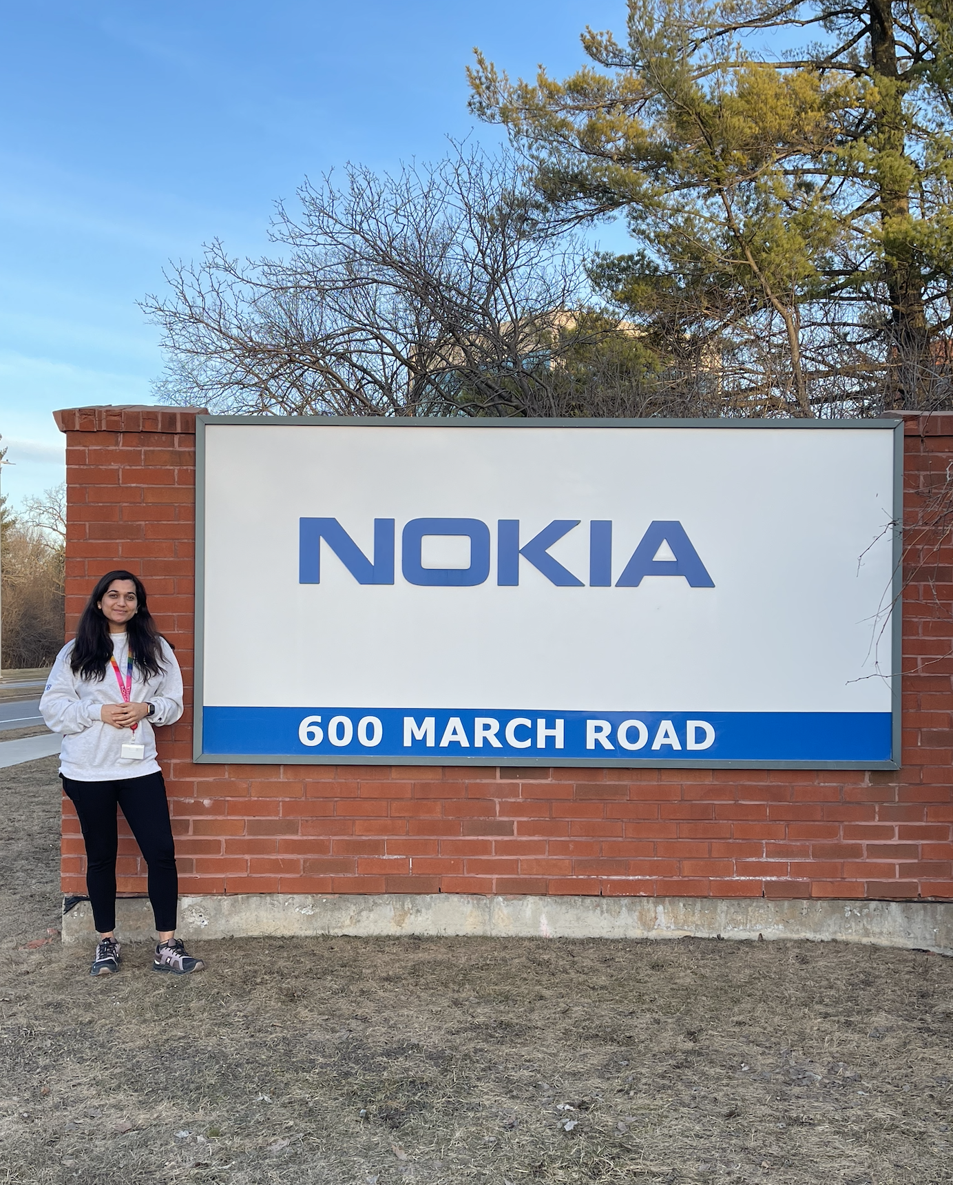 A picture of me outside the office by Nokia's board