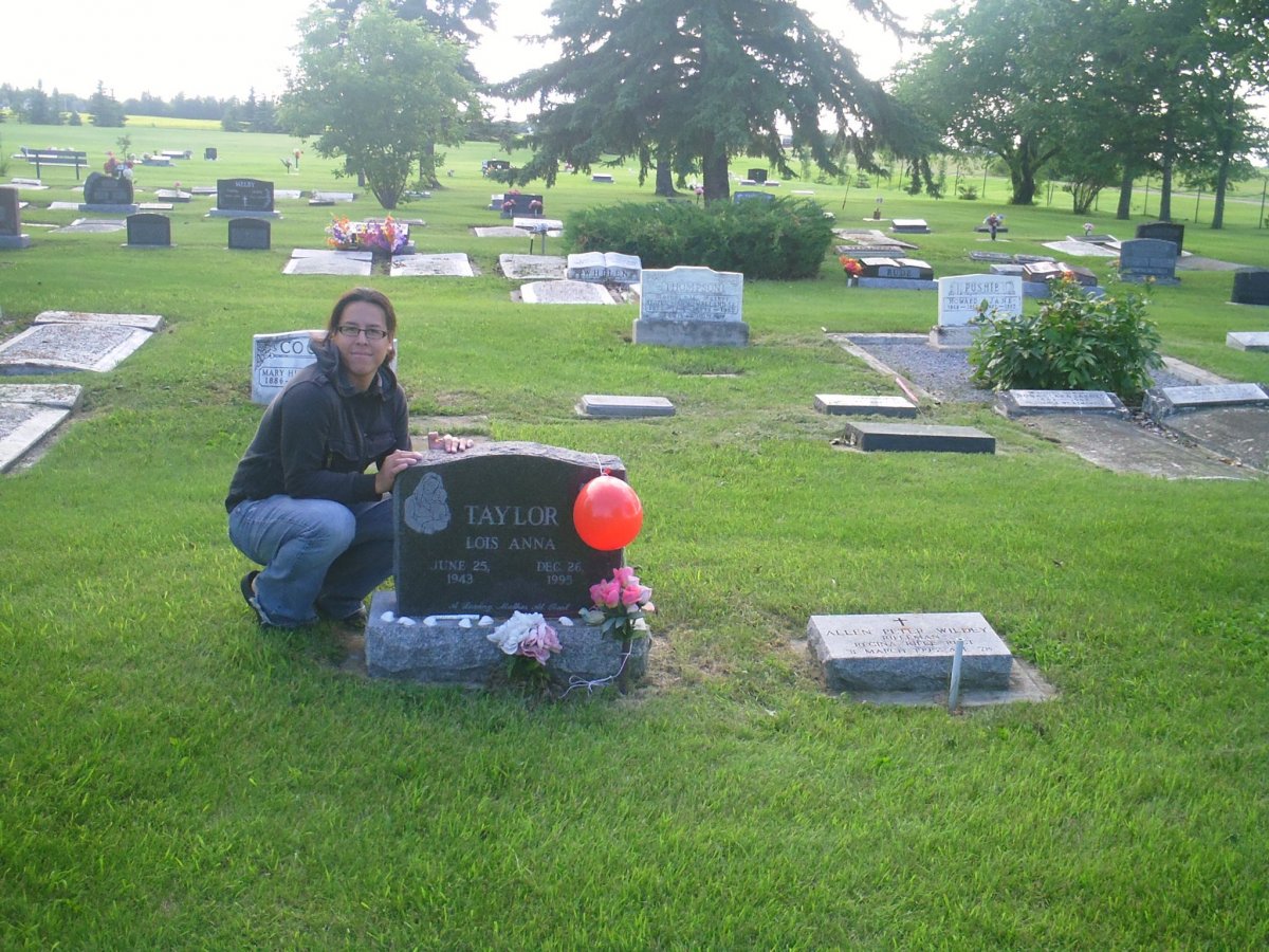 Gravestone of Adrian's first foster mom