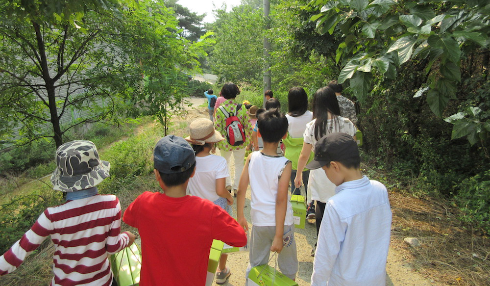 Kids walking on a trail 