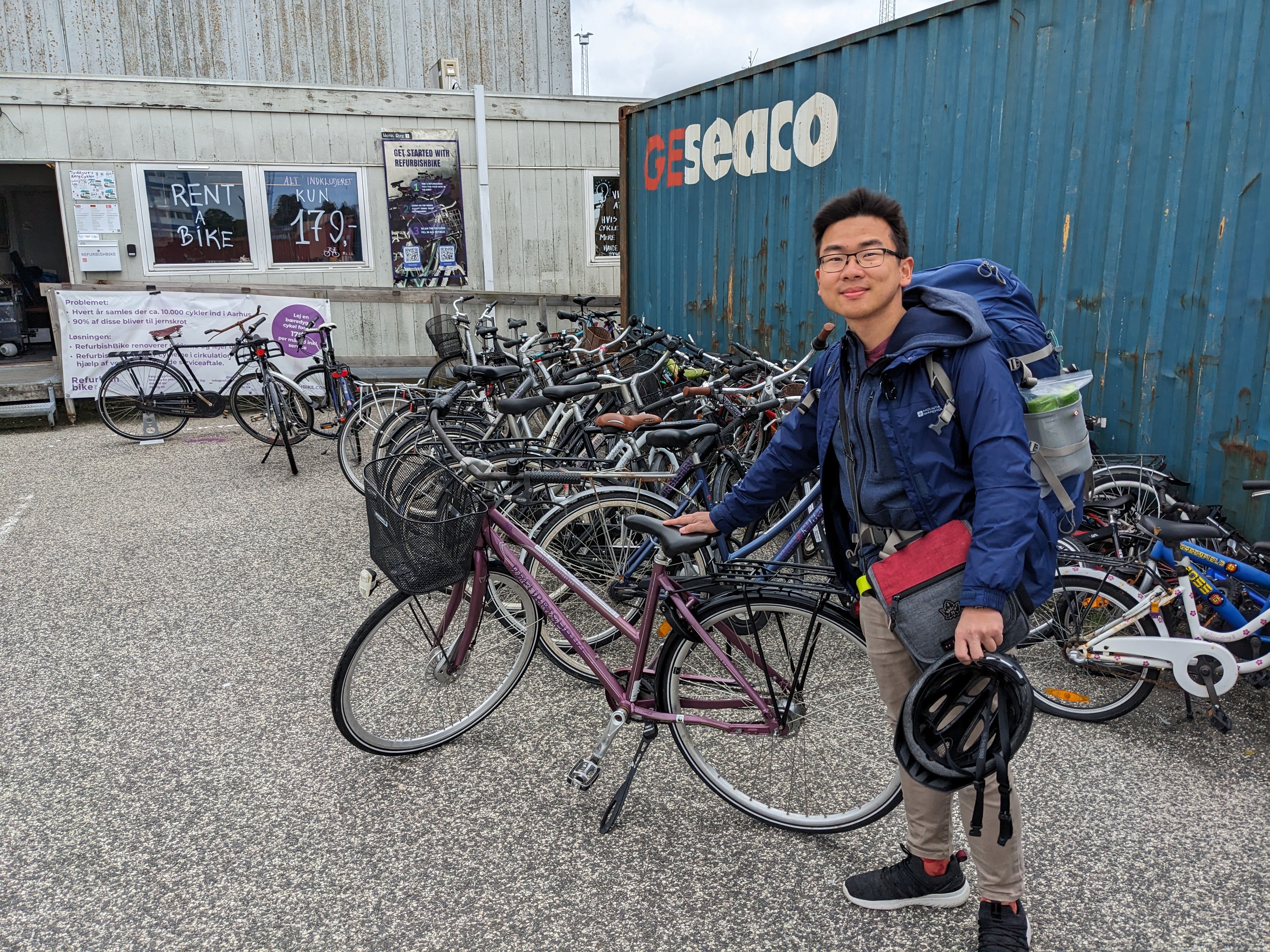 Me posing in front of the bike rental shop with my bike