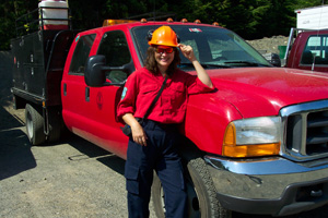 Author wearing casual fire uniform and hard hat, smiling