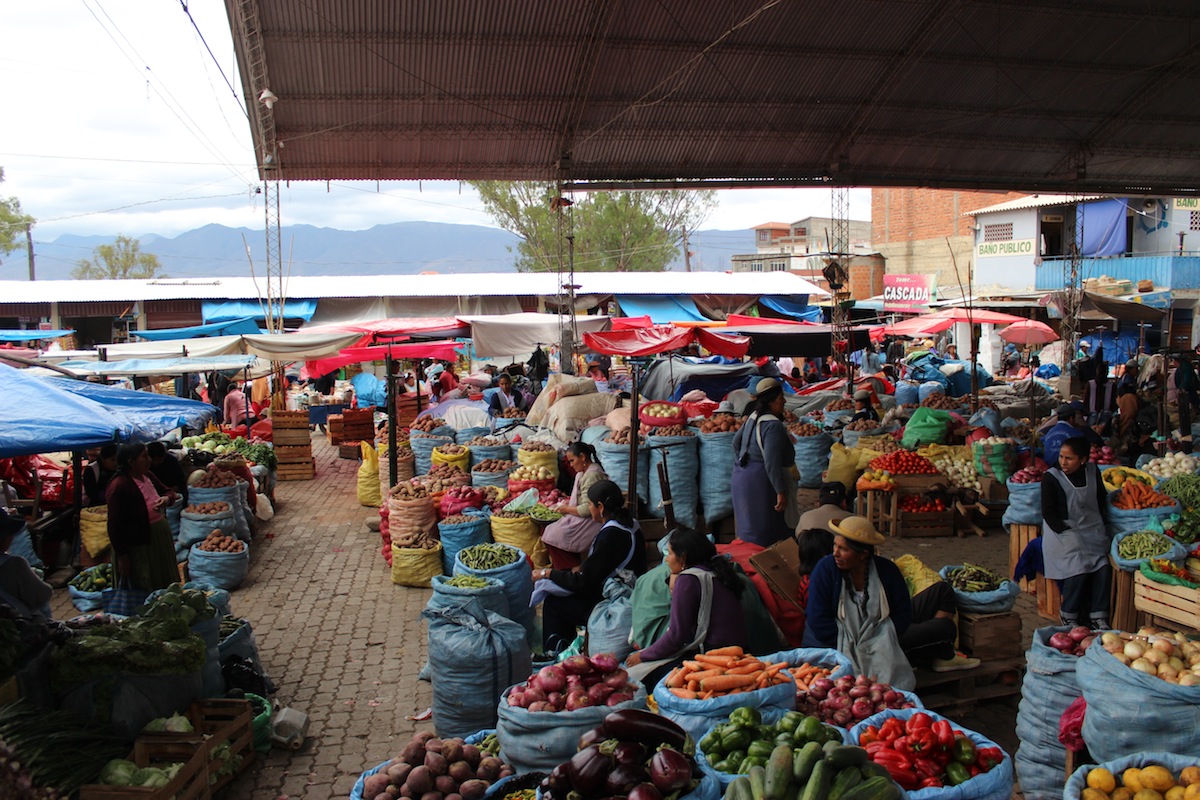 picture of a marketplace with various foods presented