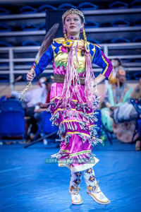 Marlana dancing in a powwow