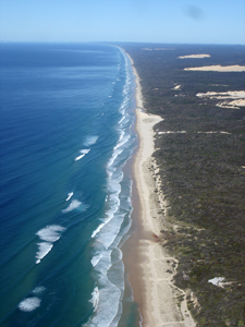 Portrait photo of the shoreline of a beach In Australia