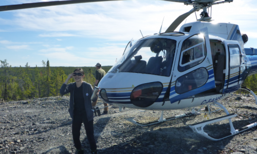 The author stepping off a helicopter