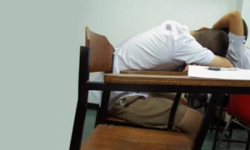 Two students sleeping in class.