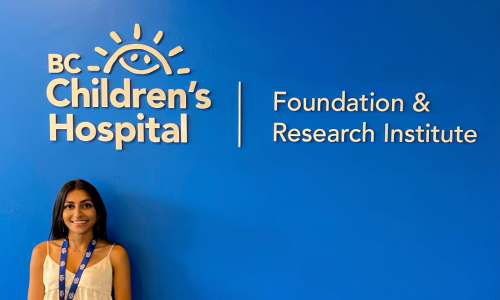 Shreya Luthra standing under the BC Children's Hospital sign.