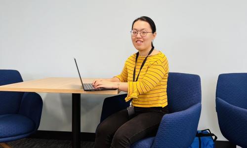 Image of Zhang Yan in the office