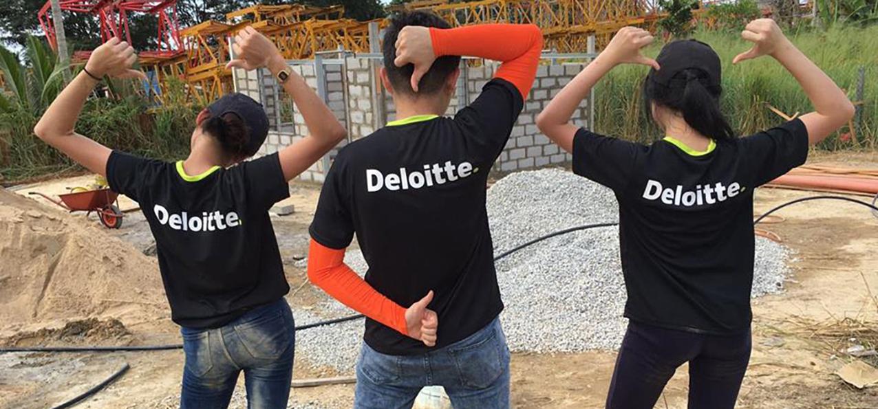 Three people in Deloitte tshirts 