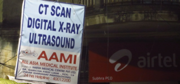 Poster with a list of services provided: CT Scan, Digital X-Ray, Ultrasound