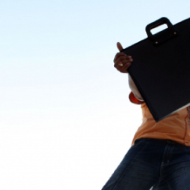 Picture of someone holding a briefcase