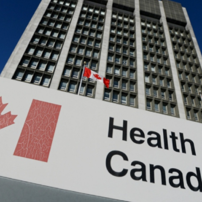 A sign is displayed in front of Health Canada headquarters in Ottawa
