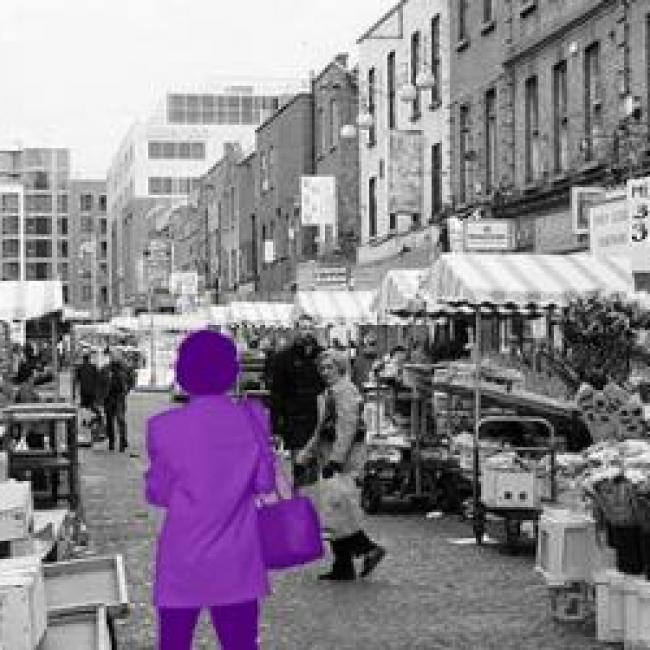 Person highlighted in purple indicating they are standing out in the fair