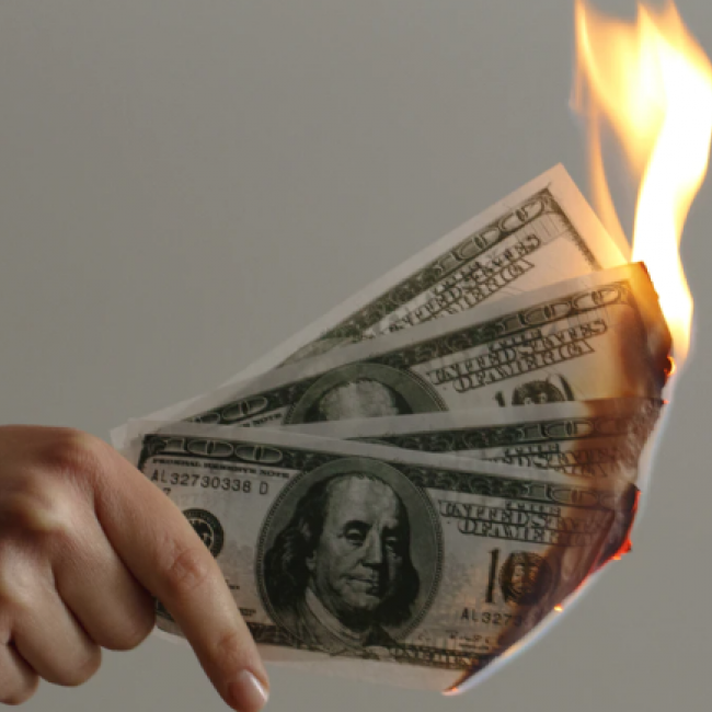 A photo of money on fire