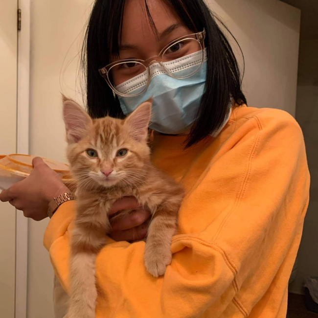 Picture of Mariel and her cat. 