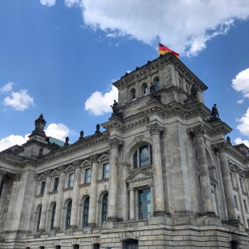 Reichstag located at Platz Der Republik. A very large historic government building.